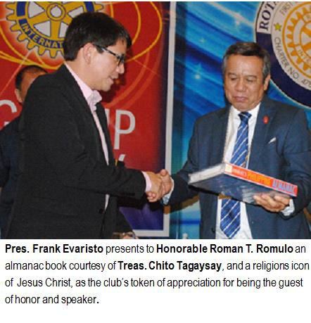 Pres. Frank Evaristo presents to Honorable Roman T. Romulo an almanac book courtesy of Treas. Chito Tagaysay, and a religious icon of Jesus Christ, as the club's token of appreciation for being the guest of honor and speaker.