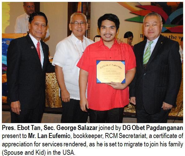 Pres. Ebot Tan, Sec. George Salazar joined by DG Obet Pagdanganan present to Mr. Lan Eufemio, bookkeeper, RCM Secretariat, a certificate of appreciation for services rendered, as he is set to migrate to join his family (Spouse and Kid) in the USA.