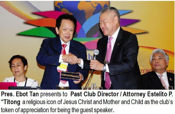 Pres. Ebot Tan presents to Past Club Director / Attorney Estelito P. "Titong" a religious icon of Jesus Christ and Mother and Child as the club's token of appreciation for being the guest speaker.