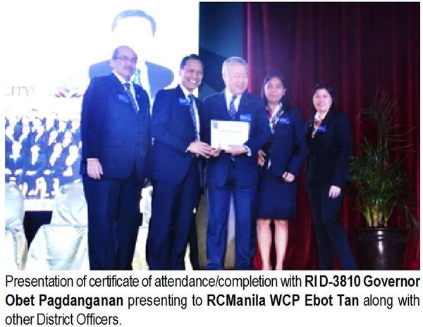 Presentation of certificate of attendance/completion with RID-3810 Governor Obet Pagdanganan presenting to RCManila WCP Ebot Tan along with other District Officers.