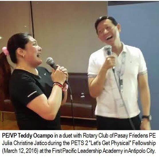 PE/VP Teddy Ocampo in a duet with Rotary Club of Pasay Friedens PE Julia Christine Jatico during the PETS 2 "Let's Get Physical" Fellowship (March 12, 2016) at the First Pacific Leadership Academy in Antipolo City.