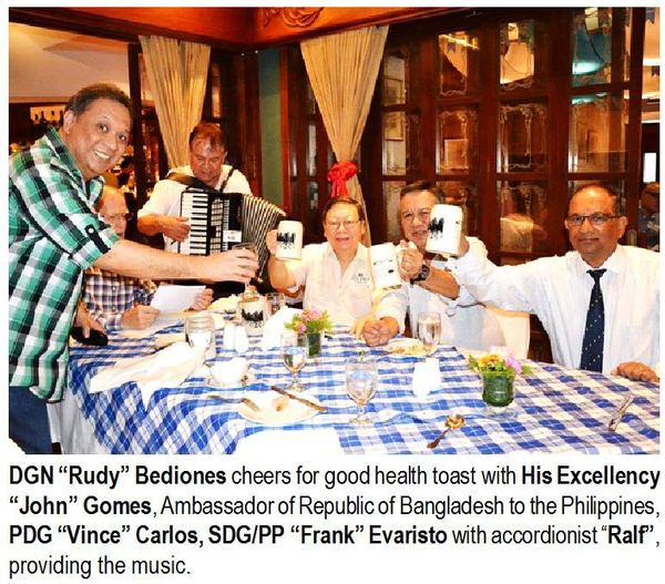 DGN "Rudy" Bediones cheers for good health toast with His Excellency "John" Gomes, Ambassador of Republic of Bangladesh to the Philippines, PDG "Vince" Carlos, SDG/PP "Frank" Evaristo with accordionist "Ralf", providing the music.