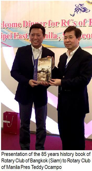 Presentation of the 85 years history book of Rotary Club of Bangkok (Siam) to Rotary Club of Manila Pres Teddy Ocampo