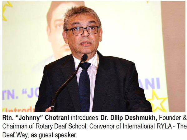 Rtn. "Johnny" Chotrani introduces Dr. Dilip Deshmukh, Founder & Chairman of Rotary Deaf School; Convenor of International RYLA- The Deaf Way, as guest speaker.