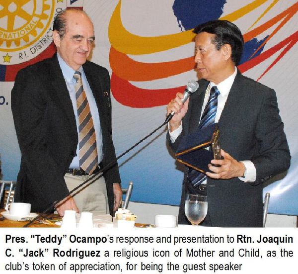 Pres. “Teddy” Ocampo’s response and presentation to Rtn. Joaquin C. “Jack” Rodriguez a religious icon of Mother and Child, as the club’s token of appreciation, for being the guest speaker