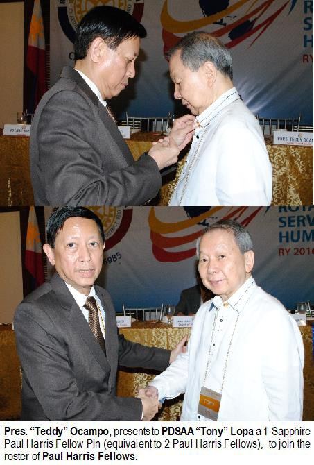 Pres. "Teddy" Ocampo presents to PDSAA "Tony" Lopa a 1-Sapphire Paul Harris Fellow Pin (equivalent to 2 Paul Harris Fellows), to join the roster of Paul Harris Fellows.