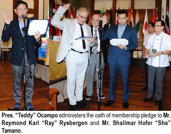 Pres. “Teddy” Ocampo administers the oath of membership pledge to Mr. Reymond Karl “Ray” Rysbergen and Mr. Shalimar Hofer “Sha” Tamano.