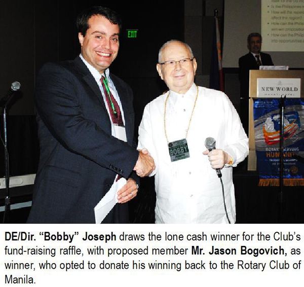 DE/Dir. “Bobby” Joseph draws the lone cash winner for the Club's fund-raising raffle, with proposed member Mr. Jason Bogovich, as winner, who opted to donate his winning back to the Rotary Club of Manila.