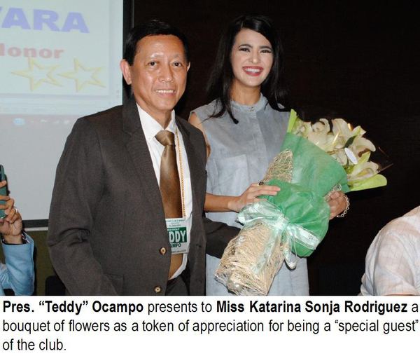 Pres. “Teddy” Ocampo presents to Miss Katarina Sonja Rodriguez a bouquet of flowers as a token of appreciation for being a “special guest”