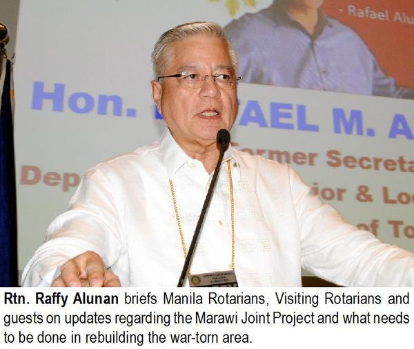 Rtn. Raffy Alunan briefs Manila Rotarians, Visiting Rotarians and guests on updates regarding the Marawi Joint Project and what needs to be done in rebuilding the war-torn area.