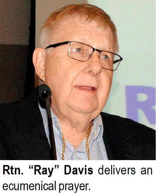 Rtn. “Ray” Davis delivers an ecumenical prayer.