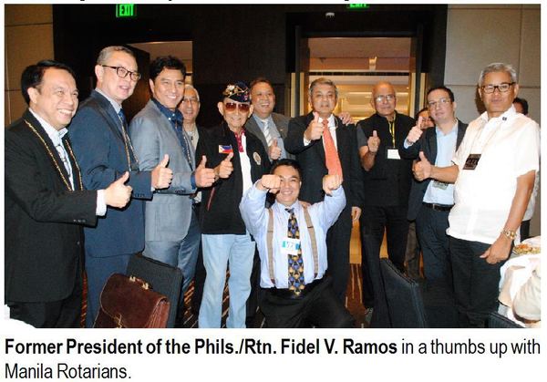 Former President of the Phils./Rtn. Fidel V. Ramos in a thumbs up with Manila Rotarians.