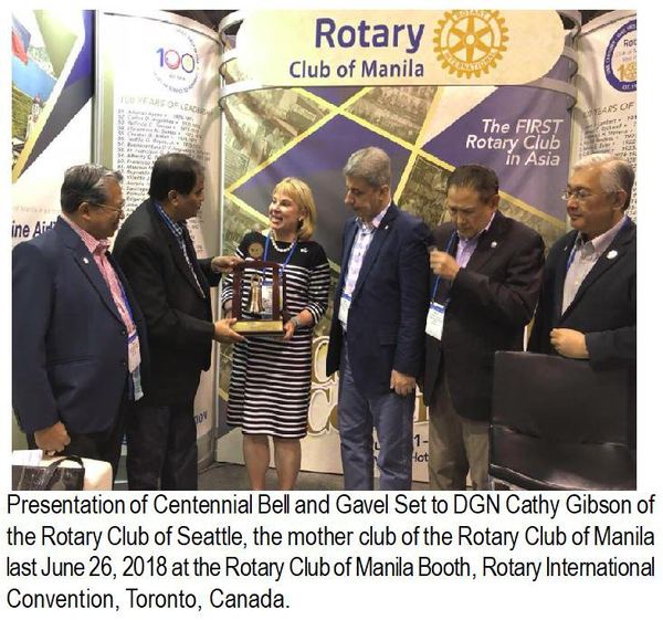 Presentation of Centennial Bell and Gavel Set to DGN Cathy Gibson of the Rotary Club of Seattle, the mother club of the Rotary Club of Manila last June 26, 2018 at the Rotary Club of Manila Booth, Rotary International Convention, Toronto, Canada.