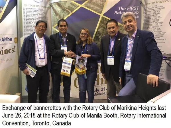 Exchange of bannerettes with the Rotary Club of Marikina Heights last June 26, 2018 at the Rotary Club of Manila Booth, Rotary International Convention, Toronto, Canada