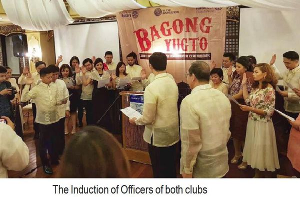 The Induction of Officers of both clubs.