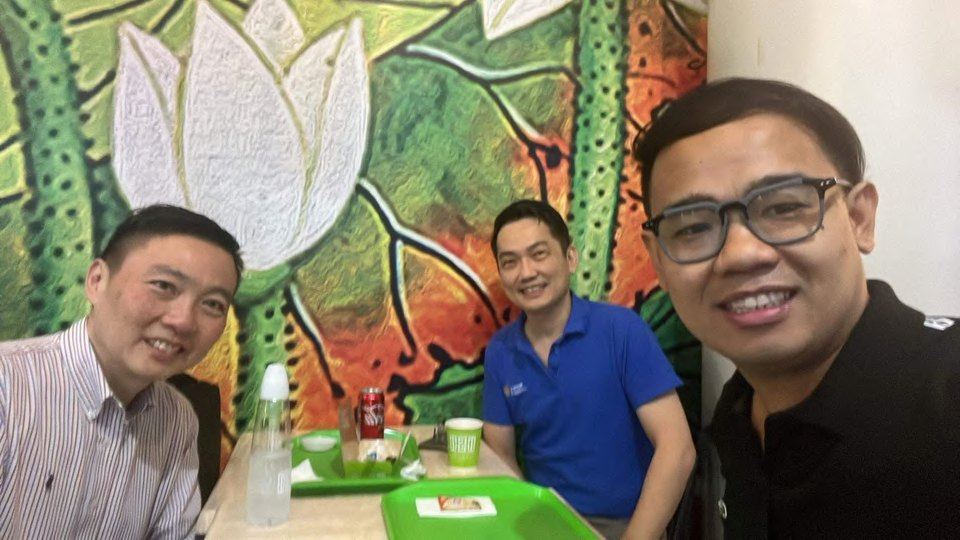 Rtn. Aries Balanay with Rotary Club of Singapore President Siew Luen Chan and Rtn. James Lee