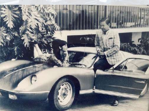 During Boy’s courtship of Monette at Valley Golf Club. That's an EMX Fiberglass Sports Car with a VW Power Train.