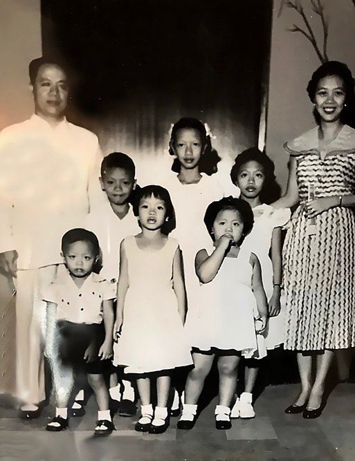 A nine-year-old Vince Carlos stands beside his father, Juan Carlos Sr., in his very first family photo — taken during the Rotary Club of Manila’s annual Children’s Christmas Party at the Manila Hotel on December 16, 1954.
