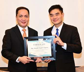 President Reggie Yu presented the Certificate of Appreciation and a hardbound copy of the 107th Anniversary Souvenir Program to guest speaker Atty. Amando Virgil D. Ligutan.
