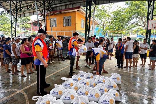 In a barangay surrounded by floodwaters, its gymnasium remained the only patch of dry ground and became a refuge for service and hope. Here in Barangay Gugo, Calumpit, the Rotary Club of Manila distributed relief packs to 70 affected families.
