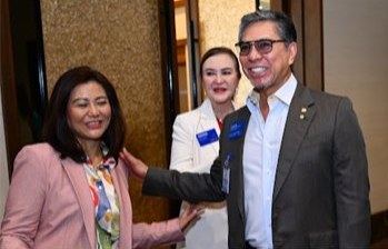 DGN Hermie Esguerra welcomed by Rotary Zone 10A Membership Chair PDG Anna Bumagat and Rotary Zone 10A Public Image Chair PDG Mildred Vitangcol.