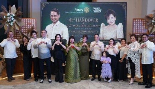DGN Hermie Esguerra as part of the group photo while flashing the Create Lasting Impact hand sign