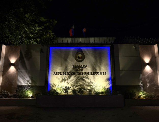 The facade of the Philippine Embassy in Cambodia is lit up in blue to celebrate World Maritime Day and honor Filipino seafarers who keep maritime trade flowing.