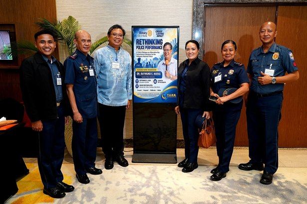 Dr. Raymund Narag joins Philippine National Police representatives for a group photo at the Rotary Club of Manila's Rethinking Police Performance forum, where research and firsthand experience met in a shared conversation about better policing.