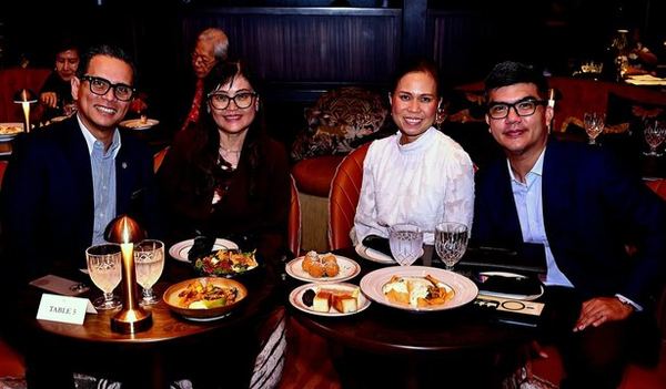 Immediate Past President Raoul Creencia and his wife, Atty. Myls, share a delightful evening with Vice President Karlo Castro and his wife, Mabelle, during our "Timeless Duets" fellowship at the Quezon Club, Solaire North. With an inviting spread before them and beloved classics filling the room, the two couples capture the pleasure of making time for friendship and each other.