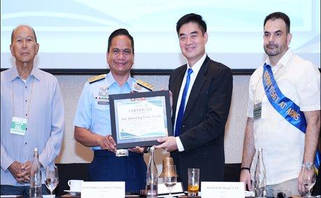 President Reggie Yu presents Rear Admiral Jay Tarriela with a Certificate of Appreciation for his insightful and engaging presentation.