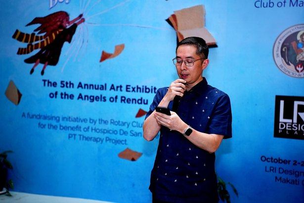 STAR Rotarian Robert Chan Jr. leads the invocation at the opening of Beyond Limits, bringing everyone together in prayer as we celebrate the Angels of Rendu and our shared service to Hospicio de San Jose.