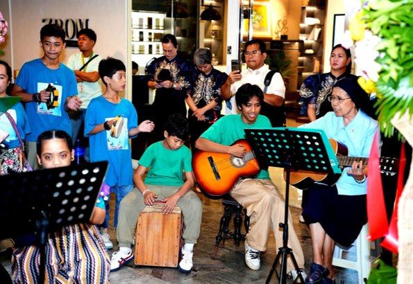 Creativity finds another voice as the children and sisters of Hospicio de San Jose share a musical number at the opening of Beyond Limits. With song, guitars, and percussion, they bring the warmth of their community to the celebration.
