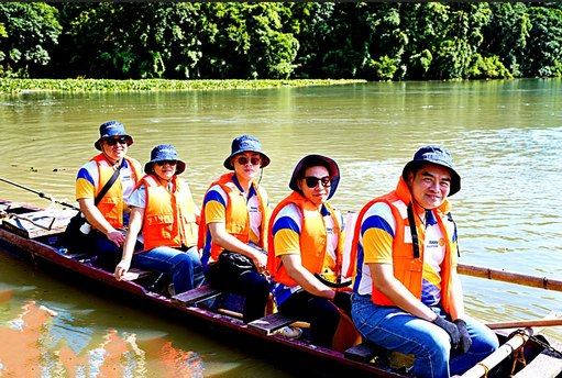 Sharing a moment of fellowship aboard our boat at Ipo Dam, surrounded by the waters and forest we came to help protect.