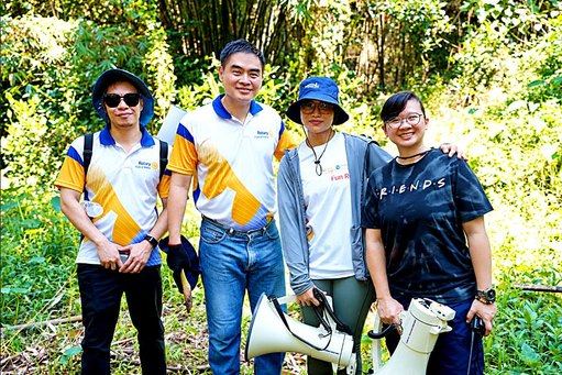 President Reggie Yu with STAR Rotarian Myles Tan, Ms. Jezreel Bean Pucio, Chief Administrative Officer and Environmental Committee Chairperson of the MWSS Regulatory Office, and her assistant, Michelle Bonoan, during the tree-planting activity at Ipo Dam.