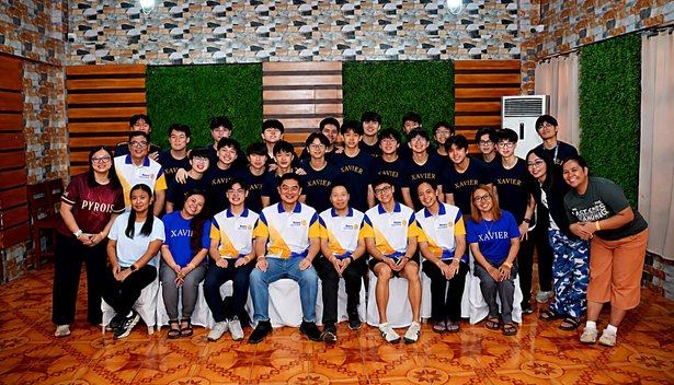 All smiles as Manila Rotarians gather for a group photo with Xavier School students, faculty, and fellow volunteers following the tree-planting activity at Ipo Dam. This gathering captures the fellowship behind RC Manila's participation in the "29,000 Trees for 29 Years" initiative, bringing together different generations through a shared commitment to service.