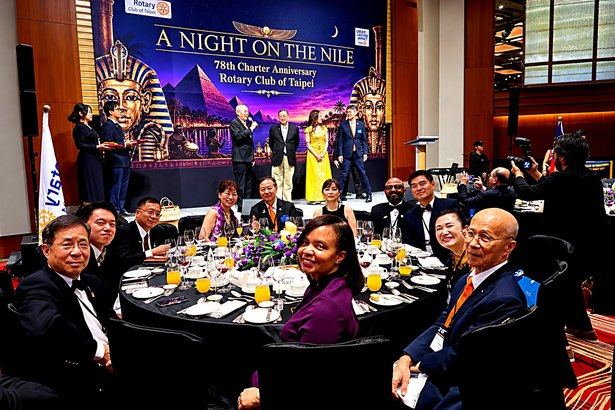 Around this table, the warmth of Rotary friendship made Taipei feel wonderfully close to home.