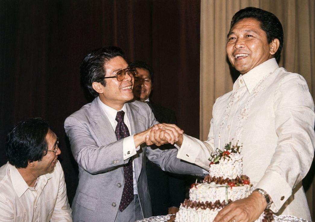 A moment of warmth, wit, and camaraderie captured at the height of an evening’s celebration. As the Rotary Club of Manila’s most sought-after finemaster, Past President Toting del Rosario (center) was known for his sharp humor and impeccable timing — qualities that made him a favorite in any gathering. On this particular occasion in September 1978, his presence drew the appreciative attention of President Ferdinand Marcos (right), who warmly extended his felicitations as he marked his 59th birthday. Looking on with evident delight is Rotary Club of Manila President Bert Romulo (left), himself a distinguished statesman, witnessing a lighthearted yet meaningful exchange among leaders bound by fellowship. More than a simple birthday greeting, the photograph reflects the unique spirit of Rotary — where leadership, friendship, and shared moments of joy come together in enduring memory