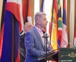 Past Director Issam Eldebs led the recitation of the Four-Way Test.