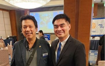 PE Reggie Yu (right) with RC Makati's Cristopher Concepcion, son of RCMer Rene Concepcion