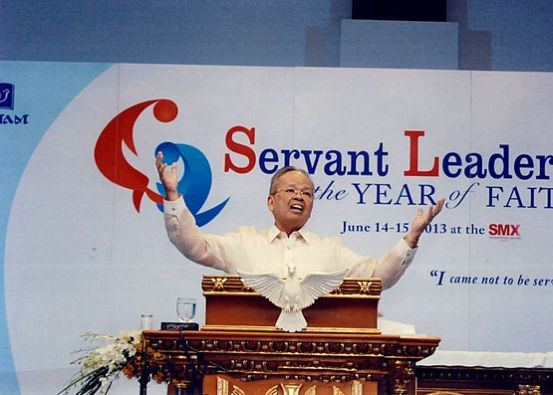 Art leads the worship services at the Servant Leadership in the Year of Faith Conference at the SMX Convention Center in June 2013, guiding the assembly in prayer and reflection with humility and spiritual depth, and embodying the integration of faith, service, and leadership that has long defined his life and public witness.