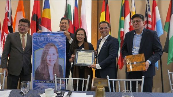 President Raoul Creencia presented Dr. Erika Fille T. Legara with a Certificate of Appreciation.
